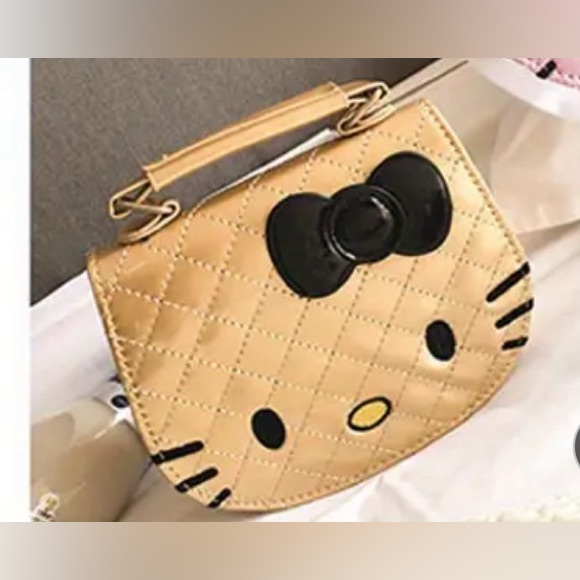 Hello Kitty Handbags - Gold hk purse